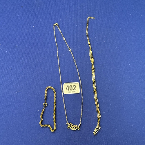 402 - TWO GOLD TONE NECKLACES ANF A ROPE TWIST BRACELET