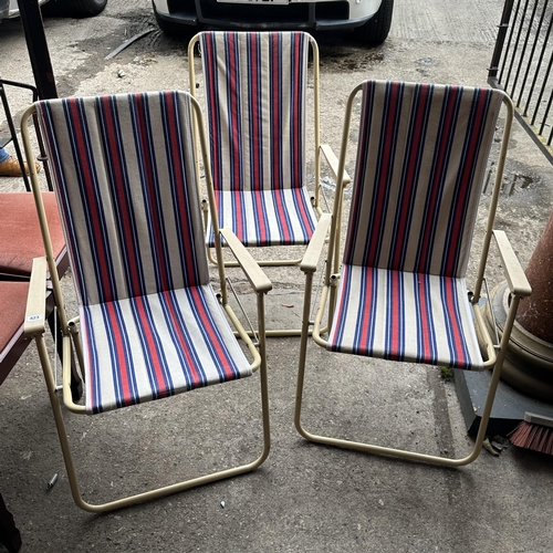 423 - THREE FOLDING STRIPED GARDEN CHAIRS