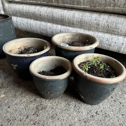 1194 - FOUR SMALL GLAZED TERRACOTTA PLANTERS