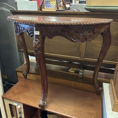 117 - MAHOGANY CABRIOLE LEG DEMI LUNE TABLE WITH PIECRUST EDGE AND CARVED APRON