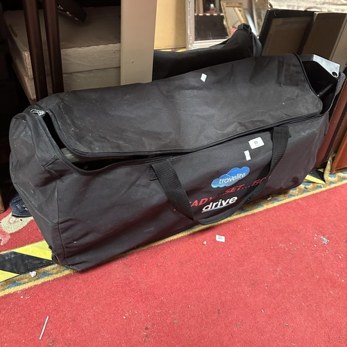 89 - TRAVELITE FOLDING WHEELCHAIR IN BAG