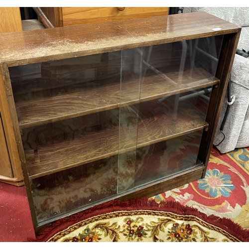 177 - OAK SLIDING DOOR GLASS FRONTED DISPLAY CABINET