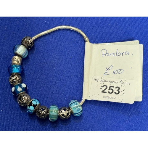 253 - PANDORA BRACELET WITH 12 CHARMS