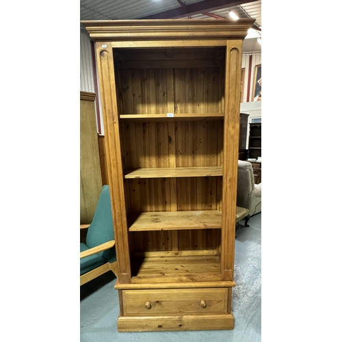 327 - PINE BOOKCASE ON SINGLE DRAWER BASE