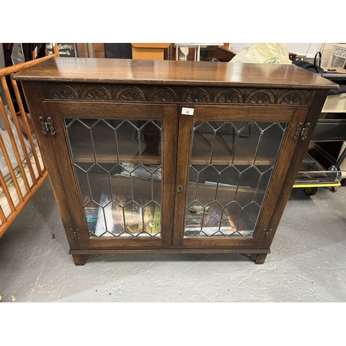 42 - SOLID OAK GLAZED BOOKCASE