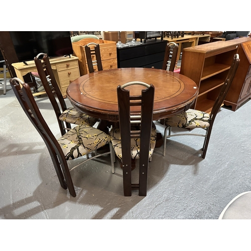 52 - MAHOGANY AND WALNUT CENTRE PEDESTAL DINING TABLE AND SIX CHAIRS