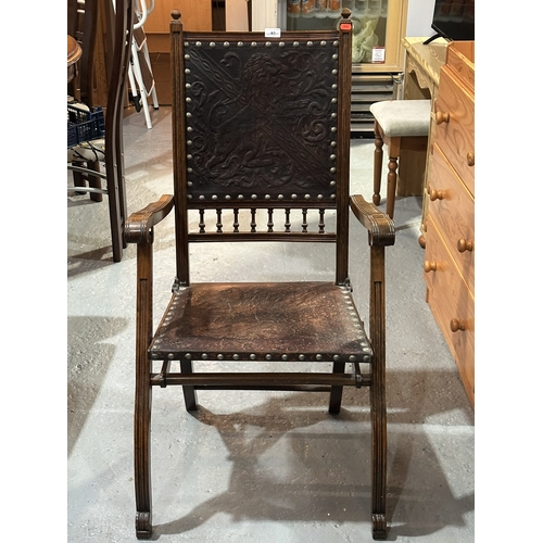 61 - VICTORIAN FOLDING LAWN CHAIR IN LEATHER AND MAHOGANY