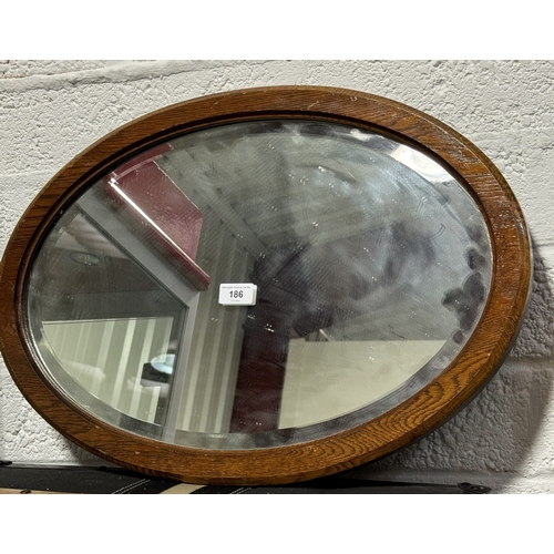 186 - OAK FRAMED OVAL MIRROR