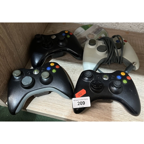 209 - 4 x XBOX 360 CONTROLLERS