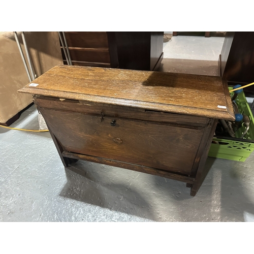 99 - ANTIQUE FOLD-AWAY CAMPAIGN BED STORED IN SMALL CABINET