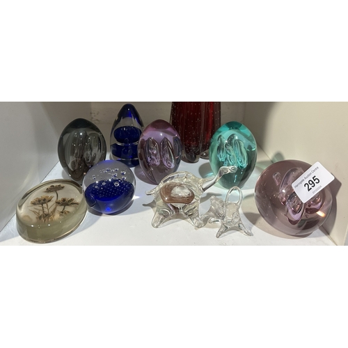 295 - SEVEN GLASS PAPERWEIGHTS