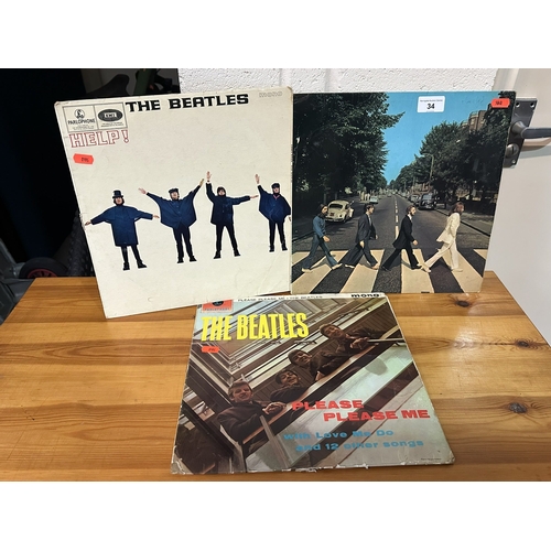 34 - THREE “THE BEATLES” LP’S INCLUDING ABBEY ROAD,PLEASE PLEASE ME AND HELP!