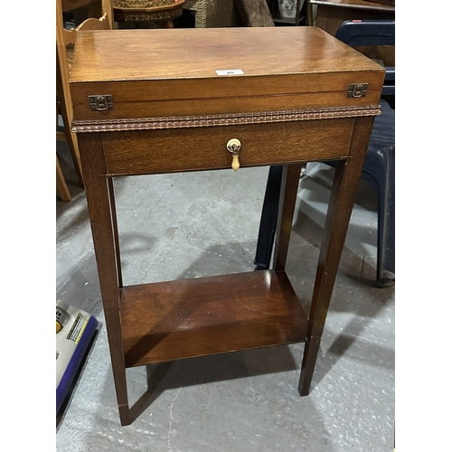 40 - CANTEEN OF CUTLERY IN MAHOGANY CABINET ON ELONGATED LEGS