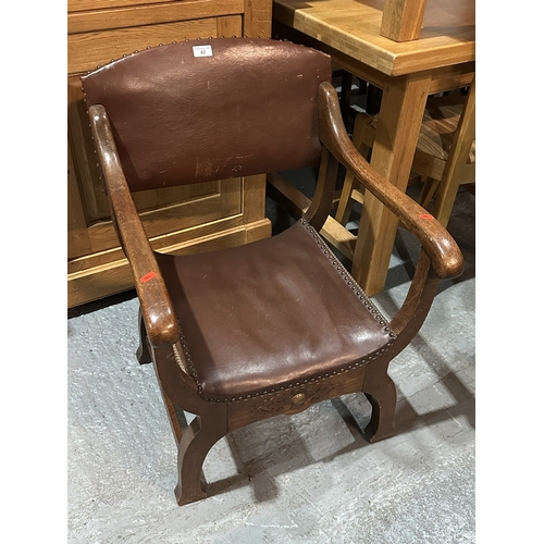 42 - ANTIQUE X FRAME CARVED OAK & STUDDED LEATHER CHAIR CIRCA 1900