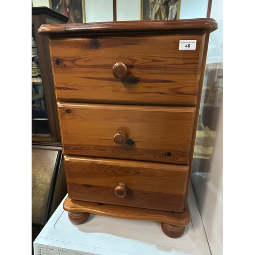 46 - PINE THREE DRAWER BEDSIDE CHEST