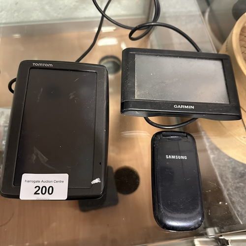 200 - SAMSUNG FLIP PHONE AND SAT NAVS BY GARMIN AND TOMTOM