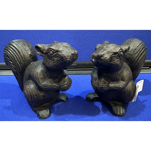 130 - TWO BRAND NEW CAST IRON SQUIRRELS