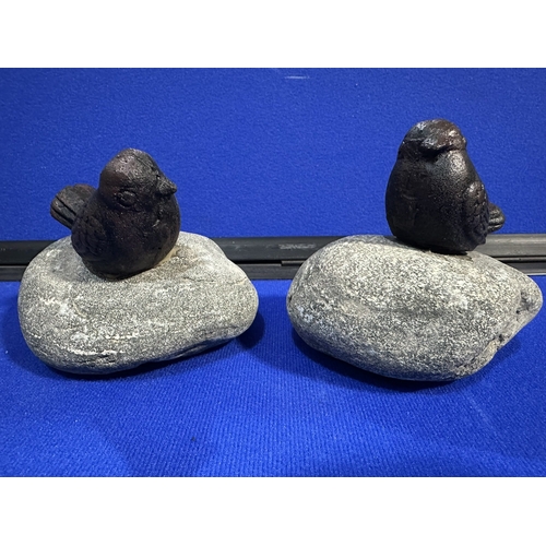 202 - CAST IRON BIRDS ON STONE GARDEN ORNAMENTS