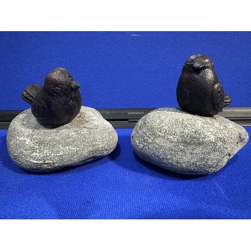 206 - CAST IRON BIRDS ON STONE GARDEN ORNAMENTS