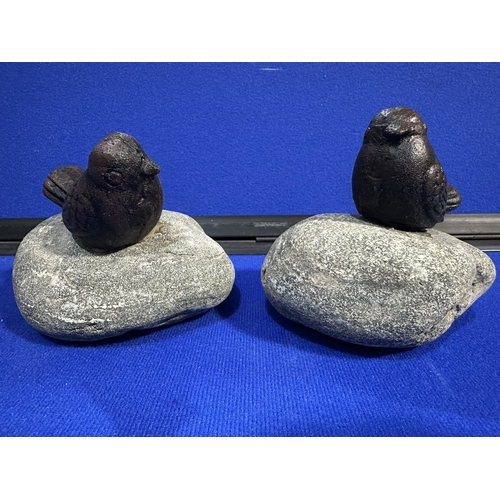 208 - CAST IRON BIRDS ON STONE GARDEN ORNAMENTS