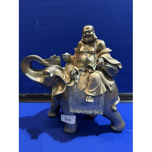 314 - BUDDHA RIDING ELEPHANT 10” TALL