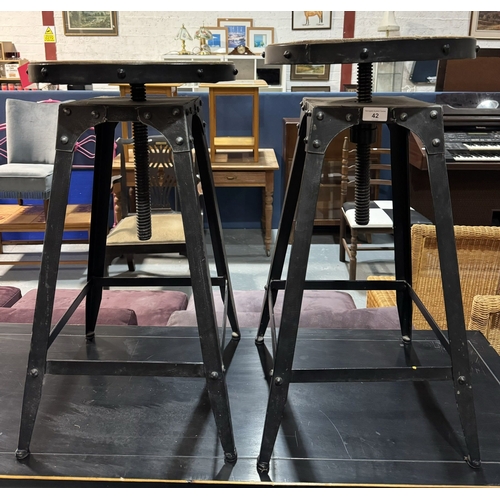 42 - PAIR OF WROUGHT IRON ADJUSTABLE BAR STOOLS