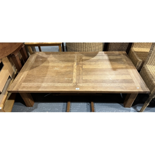 47 - SOLID OAK COFFEE TABLE WITH TWO EXTENDING LEAVES