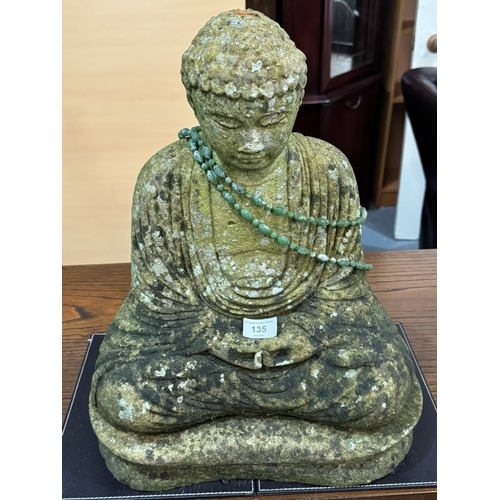 135 - STONE BUDDHA FIGURE ON PLINTH 18 INCHES TALL