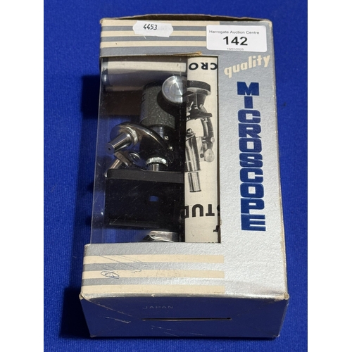 142 - BRAND NEW MICROSCOPE IN BOX