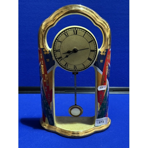 173 - VINTAGE GILT MANTEL CLOCK WITH VISIBLE PENDULUM