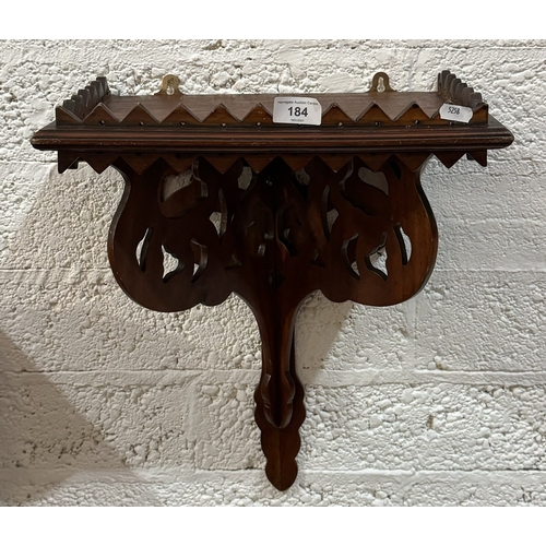 184 - MAHOGANY WALL MOUNTED PIECEWORK SHELF