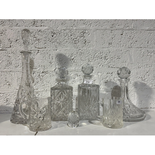 210 - LARGE COLLECTION OF LEAD CRYSTAL DECANTERS INCLUDING ROYAL DOULTON AND BOHEMIA