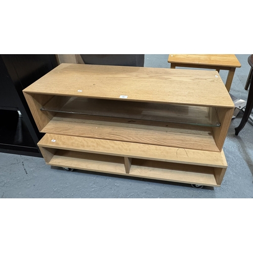 99 - TWO TV STANDS