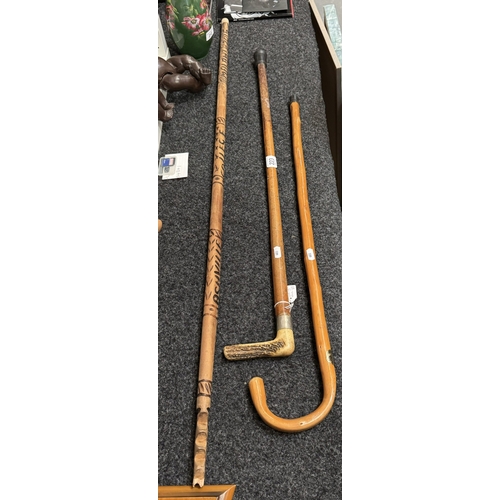 223 - THREE WOODEN WALKING STICKS