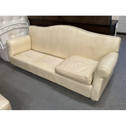 17 - ZANABONI IVORY LEATHER CAPRI THREE SEATER LEATHER SETTEE WITH SCROLL ARMS