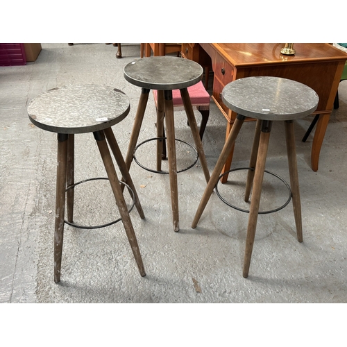 37 - THREE METAL TOP STOOLS/TABLES