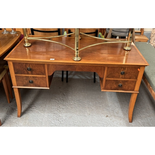 40 - BEECH AND WALNUT FIVE DRAWER DESK ON SPLAY LEGS