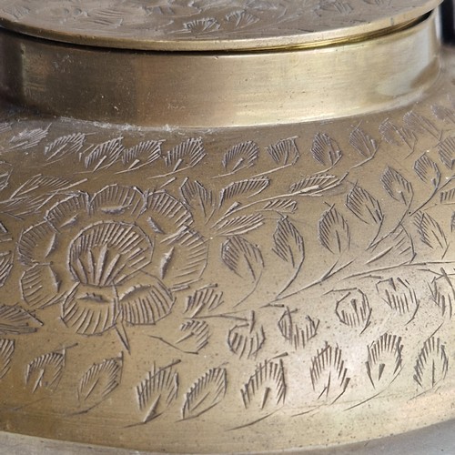 64 - ASIAN BRASS TEAPOT WITH WOODEN HANDLE AND DECORATIVE ENGRAVINGS