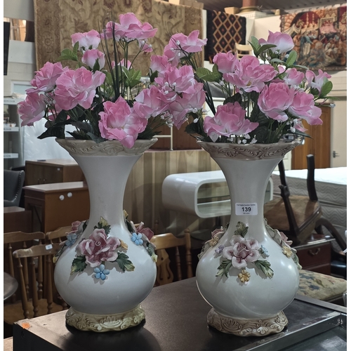 139 - PAIR OF CAPODIMONTE VASES WITH FAUX FLOWERS