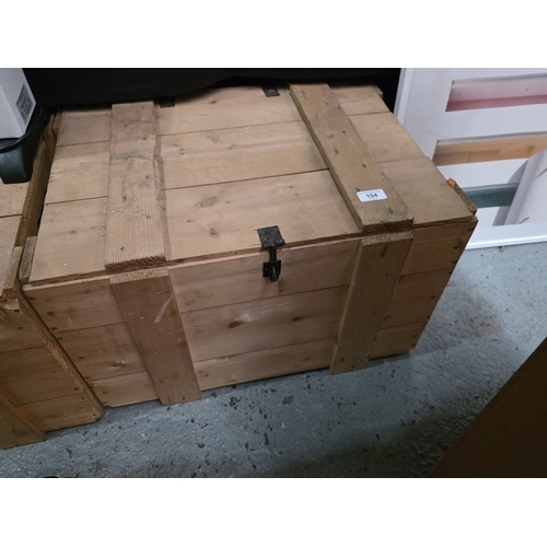 154 - WOODEN CRATE WITH METAL LATCH CONTAINING ASSORTED BOOKS
