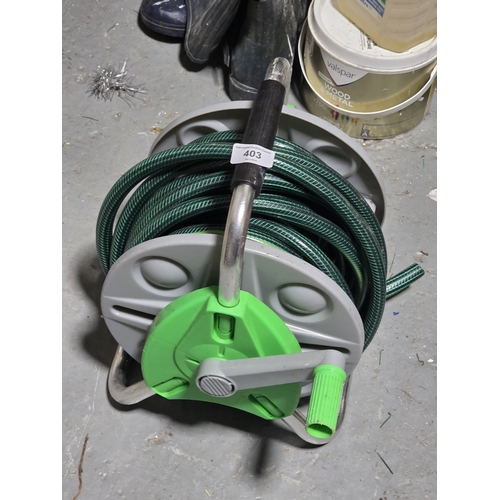 403 - HOSE ON REEL