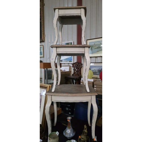411 - GRADUATED NEST OF TABLES