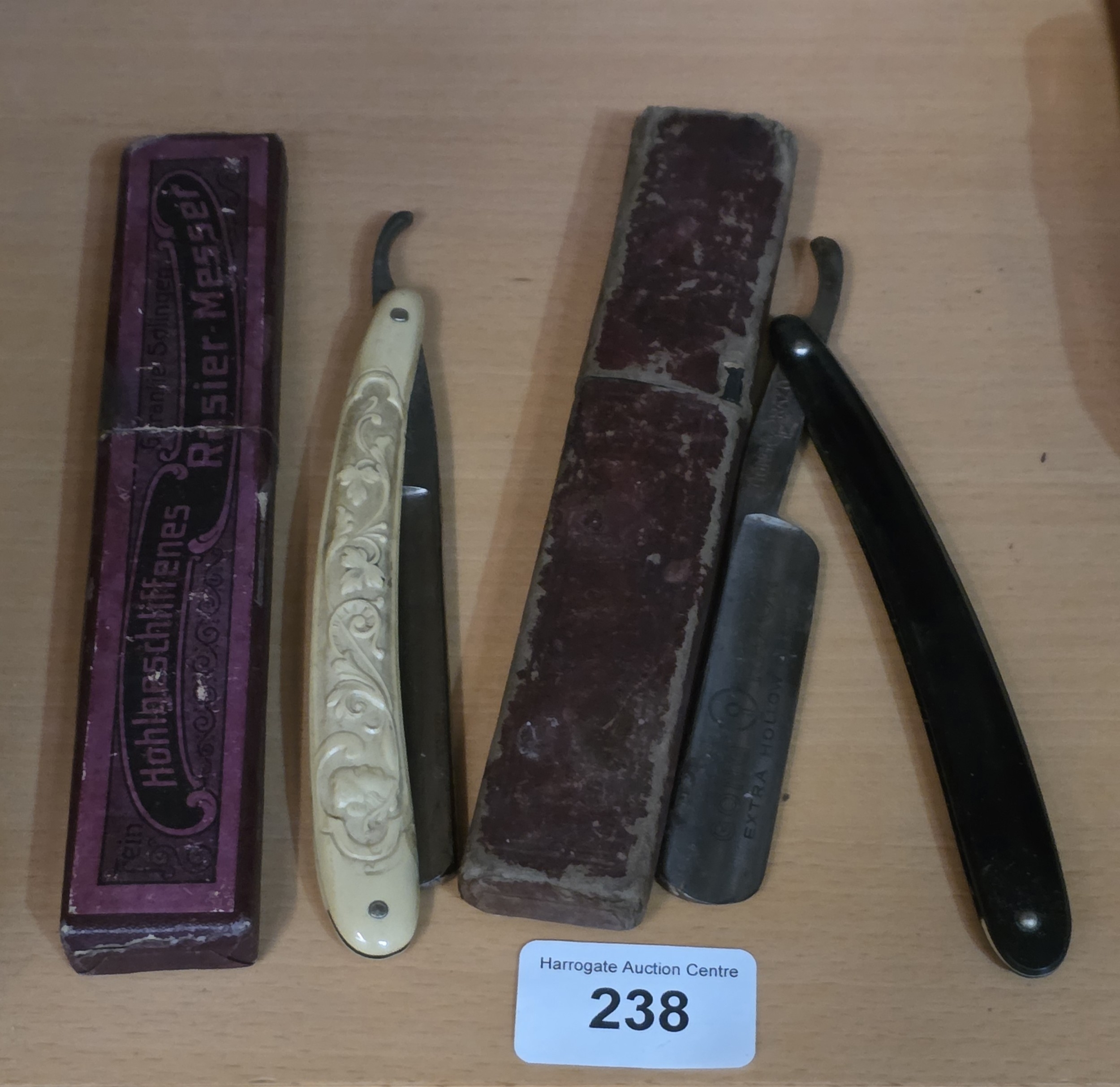 TWO EARLY GERMAN CUT THROAT RAZORS WITH ORIGINAL BOXES