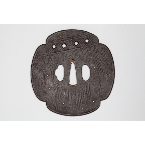 9 - Japanese mokko tsuba, 19th century Title: Mokko tsuba
Date: 19th century
Size: 11.2 x 10.9 x 0.4 cm
... 