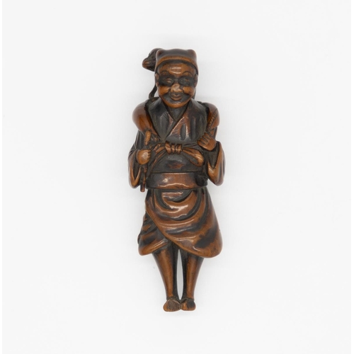 176 - Title: Wood netsuke of a standing sarumawashi (monkey trainer) with his monkey sitting on the back
D... 