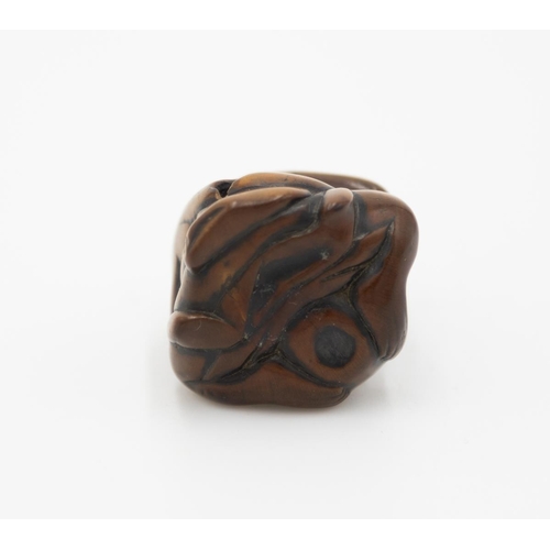 177 - Title: Wood netsuke of a seated man pounding mochi
Date: 19th century
Size: approx. (H) 3.7 x (W) 3.... 