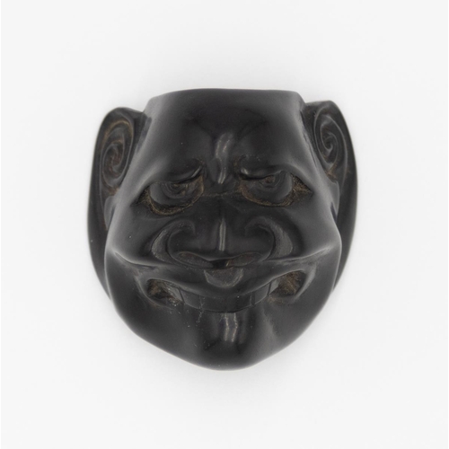 182 - Title: Wood netsuke of a grimacing man
Date: 19th century
Size: approx. (H) 3.9 x (W) 3.7 x (D) 3.0 ... 