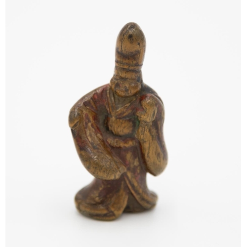 183 - Title: Wood netsuke of a dancer wearing a tall eboshi (courtier's hat)
Date: 19th century
Size: appr... 