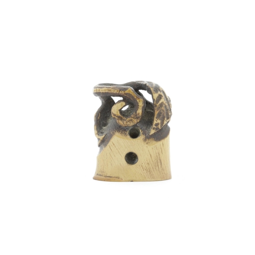 22 - Title: A wooden netsuke of a tree trunk with seal on bottom
Date: 19th century
Size: (H) 2.9 x (W) 2... 