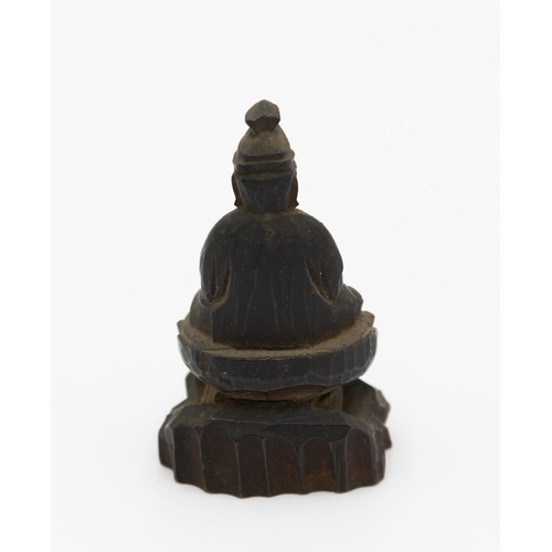 69 - * Wooden Buddha Figure
Date: Edo (1603-1868)
Size: 6.5 x 4 x 3 cm
Condition: Wear and staining consi... 